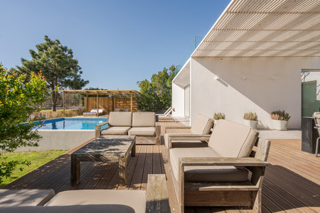 Modern villa with pool and deck with interior and exterior views