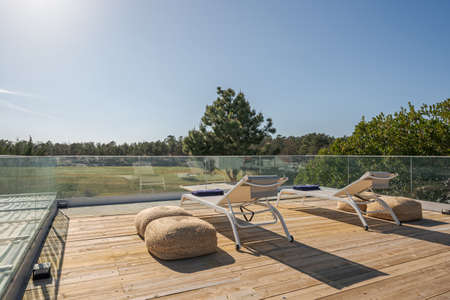 Modern villa with pool and deck with interior and exterior views
