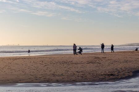 Beautiful sunset on the Carcavelos beach, Cascais, Lisbon, Portugalの写真素材