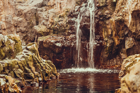Photo of Waterfall mountain view close up. Mountain river waterfall landscape.の写真素材