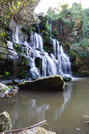 Photo of Waterfall mountain view close up. Mountain river waterfall landscape.の写真素材