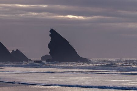 Beautiful sunset at Adraga beach, Sintra, Portugalの写真素材