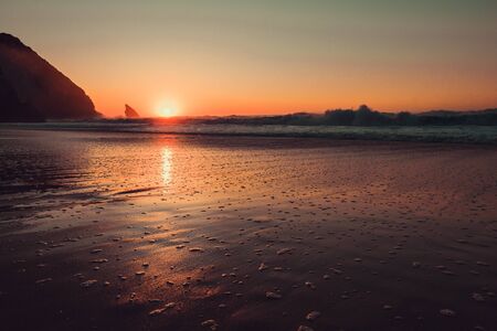 Sunset on Adraga Beach, Power of Nature, Sintra, Portugalの写真素材