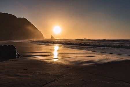Sunset on Adraga Beach, Power of Nature, Sintra, Portugalの写真素材