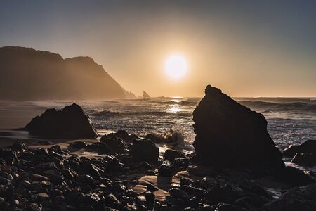 Sunset on Adraga Beach, Power of Nature, Sintra, Portugalの写真素材