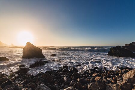 Sunset on Adraga Beach, Power of Nature, Sintra, Portugalの写真素材