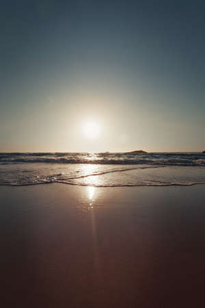Beautiful sunset on the Adraga beach, Sintra, Lisbon, Portugalの写真素材