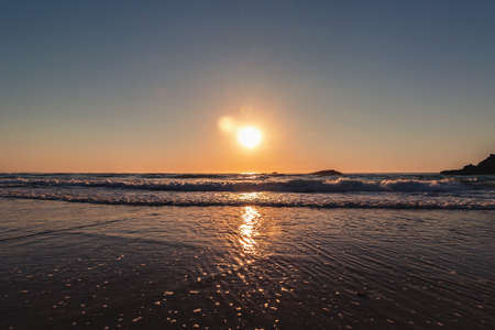Beautiful sunset on the Adraga beach, Sintra, Lisbon, Portugalの写真素材