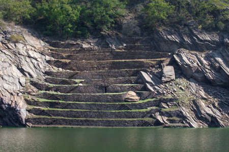 ancient terraces for vineyards on the banks of the River Minho, PortomarÃ­n, Lugo, Galiciaの写真素材