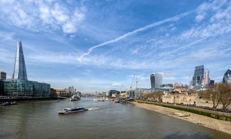 The commercial and business district of London, on the banks of the River Thames