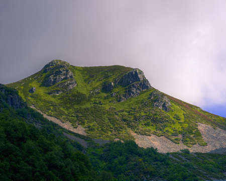 Rocky Moraines and Green Grasslands on the slopes of a Peak in Ancares Mountain Range