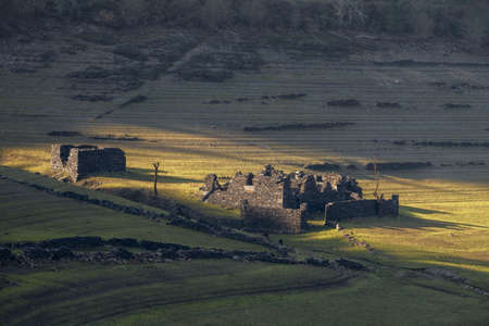 Remains of the houses of the old village of portomarin show up when the level of the reservoir goes...