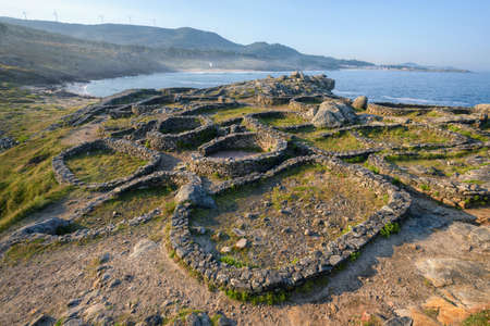 Classic circular structures make up the walls of the ancient Celtic settlements such as the Castro de Baronha in Galiciaの写真素材
