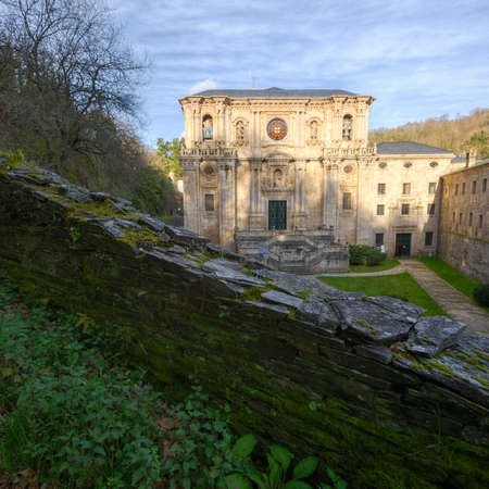 Stone wall in front of the Benedictine monastery of St. Julian of Samos, on the Camino de Santiago, Samos, Lugo, Galiciaのeditorial素材