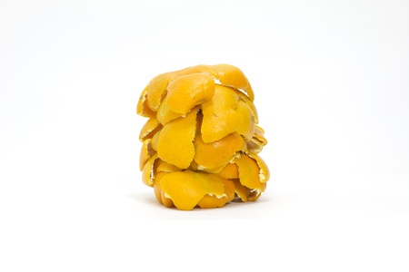 skin of the tangerine put in heap on white backgroundの写真素材