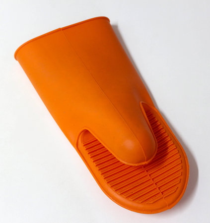 Luva protetora do calor, de borracha.  Protective sleeve heat, rubberの写真素材