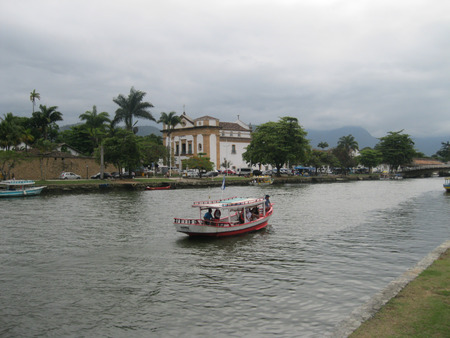 Boats in Rio Perequ?-a?u which crosses the city of Paraty, Rio de Janeiro, Brazil, in 2015.のeditorial素材