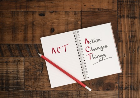 ACT  concept hand-written in notebookの写真素材