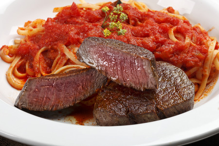 Filet mignon with pastaの写真素材