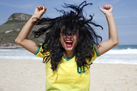 Woman celebrating goal in soccer Brazil