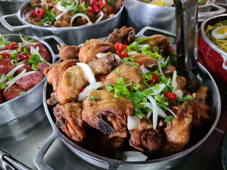 Fried chicken served in aluminum pan