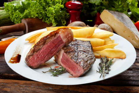 Picanha, traditional Brazilian beef cut, with french friesの写真素材