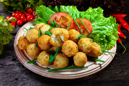 cod dumpling, salt cod fritters, bunuelos de bacalao. Brazilian snack "bolinho de bacalhau"の写真素材