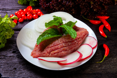 Raw kibbeh with mint leaf and radish, quibe cruの写真素材