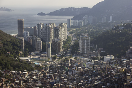 Rio de Janeiro, Brazil: View of Favela da Rocinha, the biggest slum in Rio de Janeiro. The place is located at the south zone of the city with view to the sea.のeditorial素材