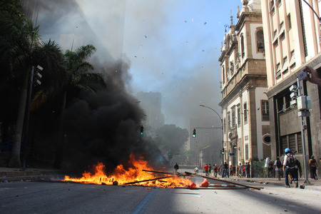 Rio de Janeiro, Brazil, December 6, 2016: Tension in Rio de Janeiro downtown. Demonstrators and...
