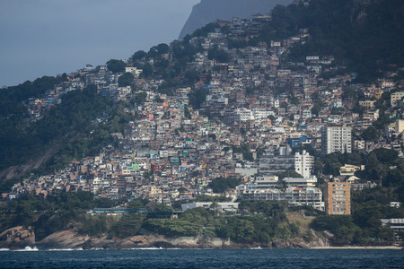 View of Vidigal Favela in Rio de Janeiro, located between Leblon and SÃ£o Conrado, two of Rio de Janeiro's noblest neighborhoods. The Vidigal favela was built on Two Brothers Hill and despite being a poor region, it is a popular tourist spot in Rio de Janのeditorial素材