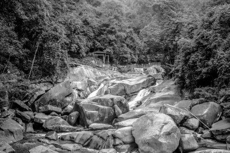 Pavilion and bridge on rocksの写真素材
