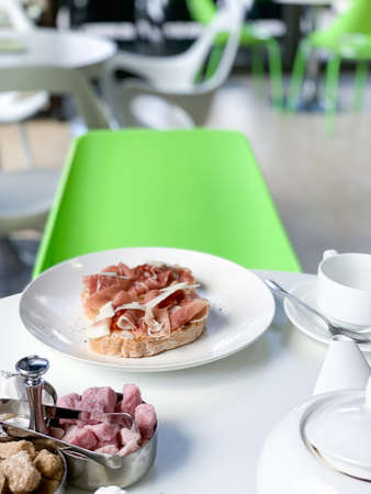 bruschetta with jamon in a white plateの写真素材