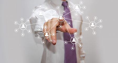Businessman pressing virtual media type of buttons 