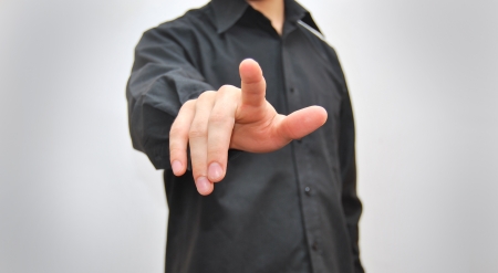 Businessman pressing an imaginary button