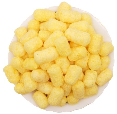 Corn sticks in a plate on a white background.                   の写真素材