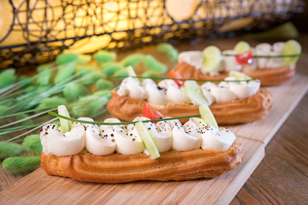 Homemade cheese mousse and truffle eclairの写真素材