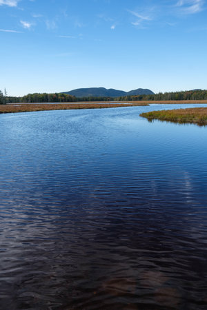 Wide angle shot of a lake in Acadia National Park with deep coloursの写真素材