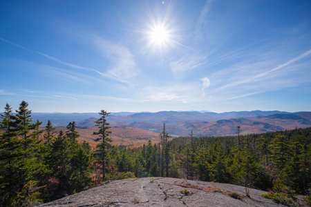 A view of a fall colored valley in White Mountain National forest