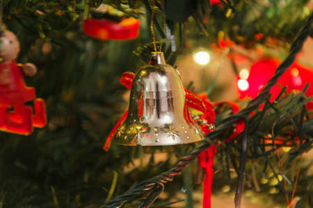 Detail of christmas tree decoration. Merry Christmas and happy New Year, 24th of December. Close up view of Christmas tree twig with ornamentsの写真素材