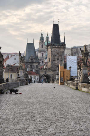 Prague, Czech Republic-17 of March 2020: Charles Bridge Entrance Gate in Pragueのeditorial素材