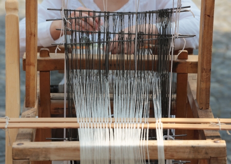 Front view of an old hand loom weaving machineの写真素材