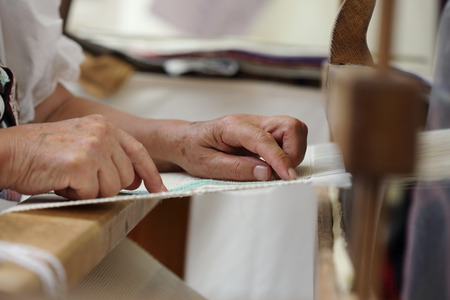 Close-up view of hand loom weaverの写真素材