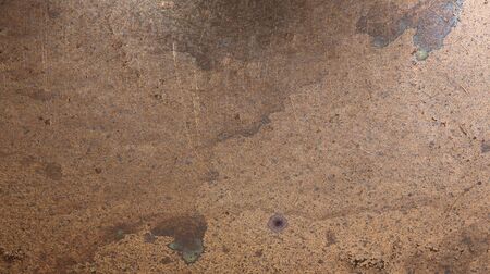 Detail view of an old scratched copper texture surface