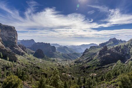 View of the tops of mountain ridges hills and rocks lining the landscape into the distance rises the ridges in the Canary Island National Parkの写真素材