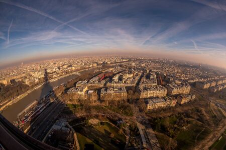 Paris France famous Eiffel Tower view during sunset from top of tower to city landmark
