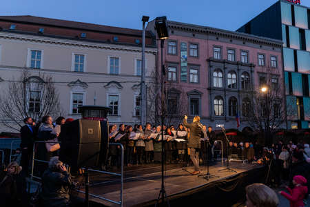 BRNO, CZECH REPUBLIC - NOVEMBER 30, 2018:Moravske namesti (square) during Christmas for event for set up the Christmas tree on square huge crowd people and public transport in background Christmas decoration on surrounding buildings...のeditorial素材