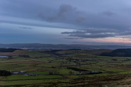 Colored sky in late time inside UK country sideの写真素材