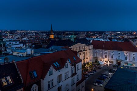 The center of the city of Brno in the Czech Republic during a dramatic sunset captured from a beautiful view on the Old Tower on the way to the Square of Freedomの写真素材