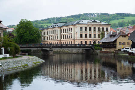 Panoramic landscape view on river Vltava in the historic city of Cesky Krumlov with famous Church cityのeditorial素材